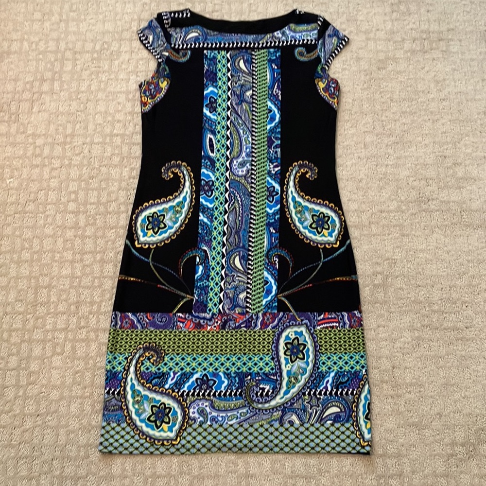 Fabulous black dress with fun pattern.